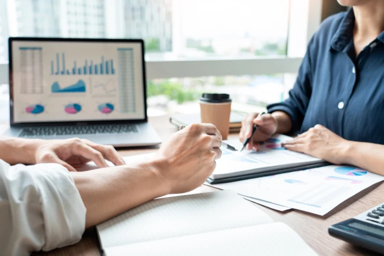 business executives discussing document work